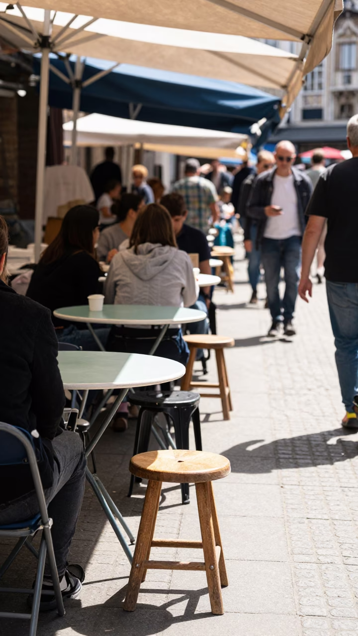 Busy Brussels Midday Street Scene with Folding Tables and Sunlight in in Brussels, Belgium