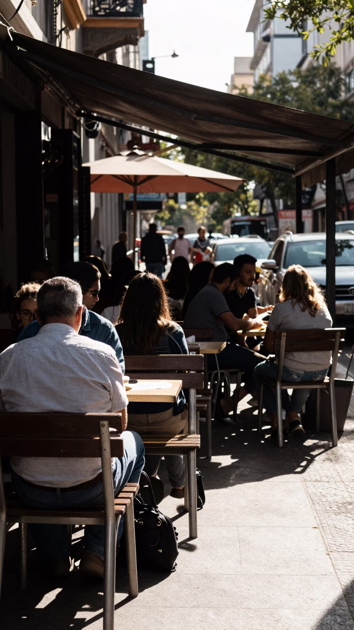 Busy Buenos Aires Cafe Terrace Late Morning Sunlight and Urban Life in in Buenos Aires, Argentina