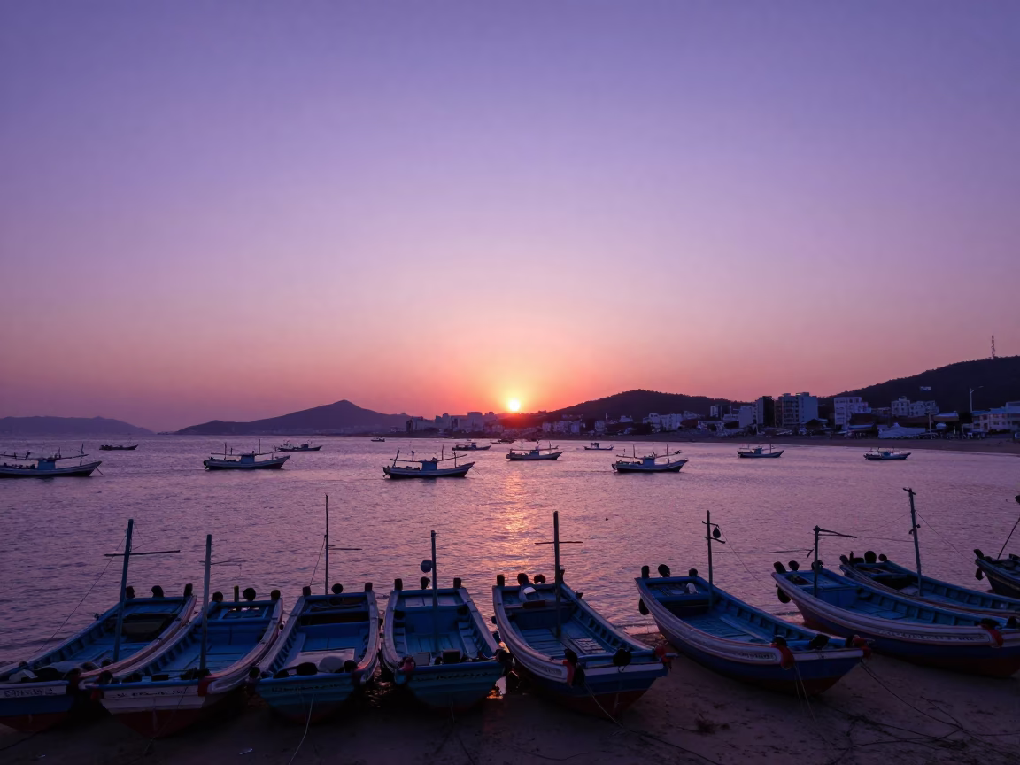 Busy Busan Harbor Sunset with Traditional Fishing Boats and Modern City Skyline in in Busan, South Korea