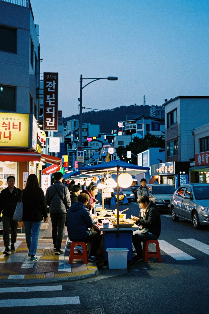 Busy Busan Street Corner at Dusk with Local Vendor and Combs in in Busan, South Korea