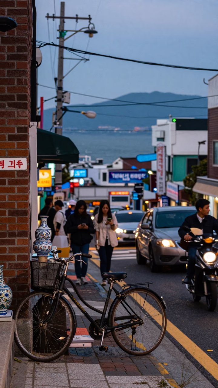Busy Busan Street Corner Evening with Bicycle and Porcelain Bowl in in Busan, South Korea