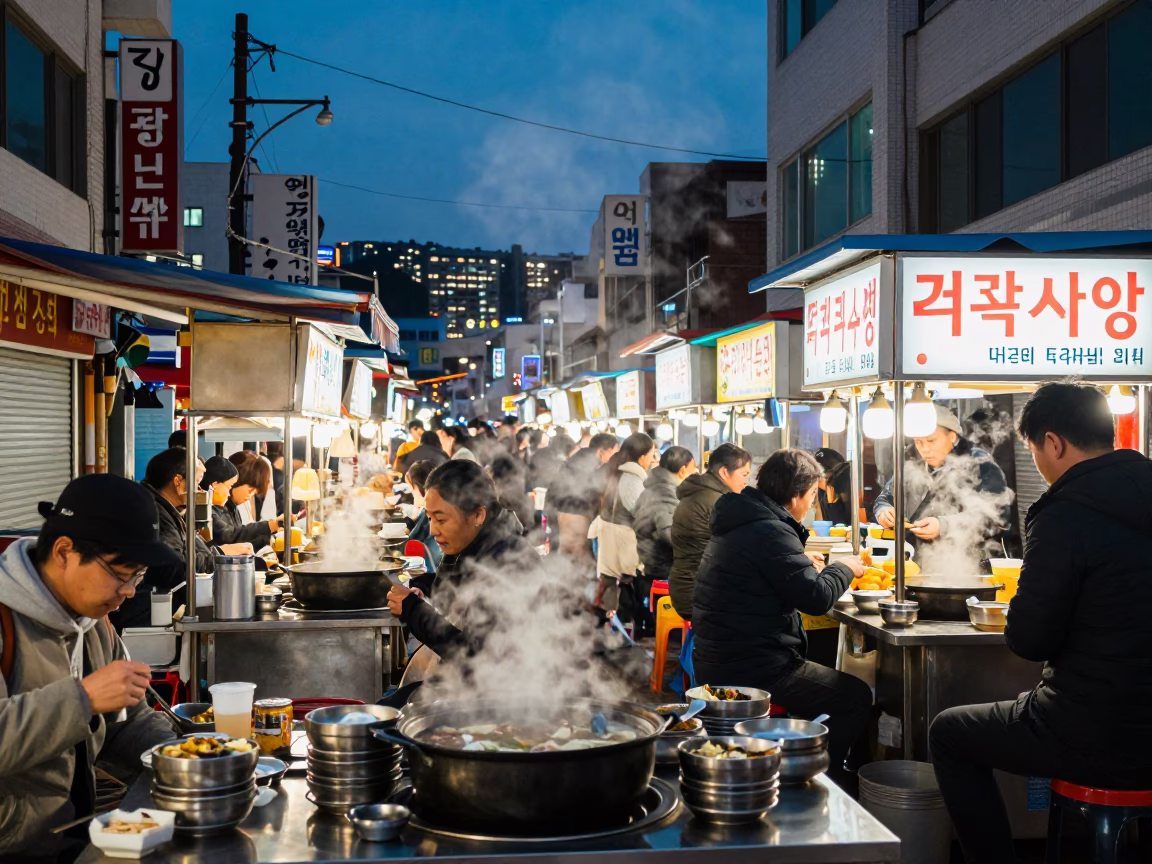 Busy Busan Street Food Stall at Dusk with Steam and City Lights in in Busan, South Korea