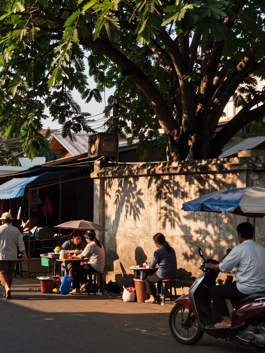 Busy Chiang Mai Street Scene Early Afternoon with Local Vendor and Traditional Architecture in in Chiang Mai, Thailand