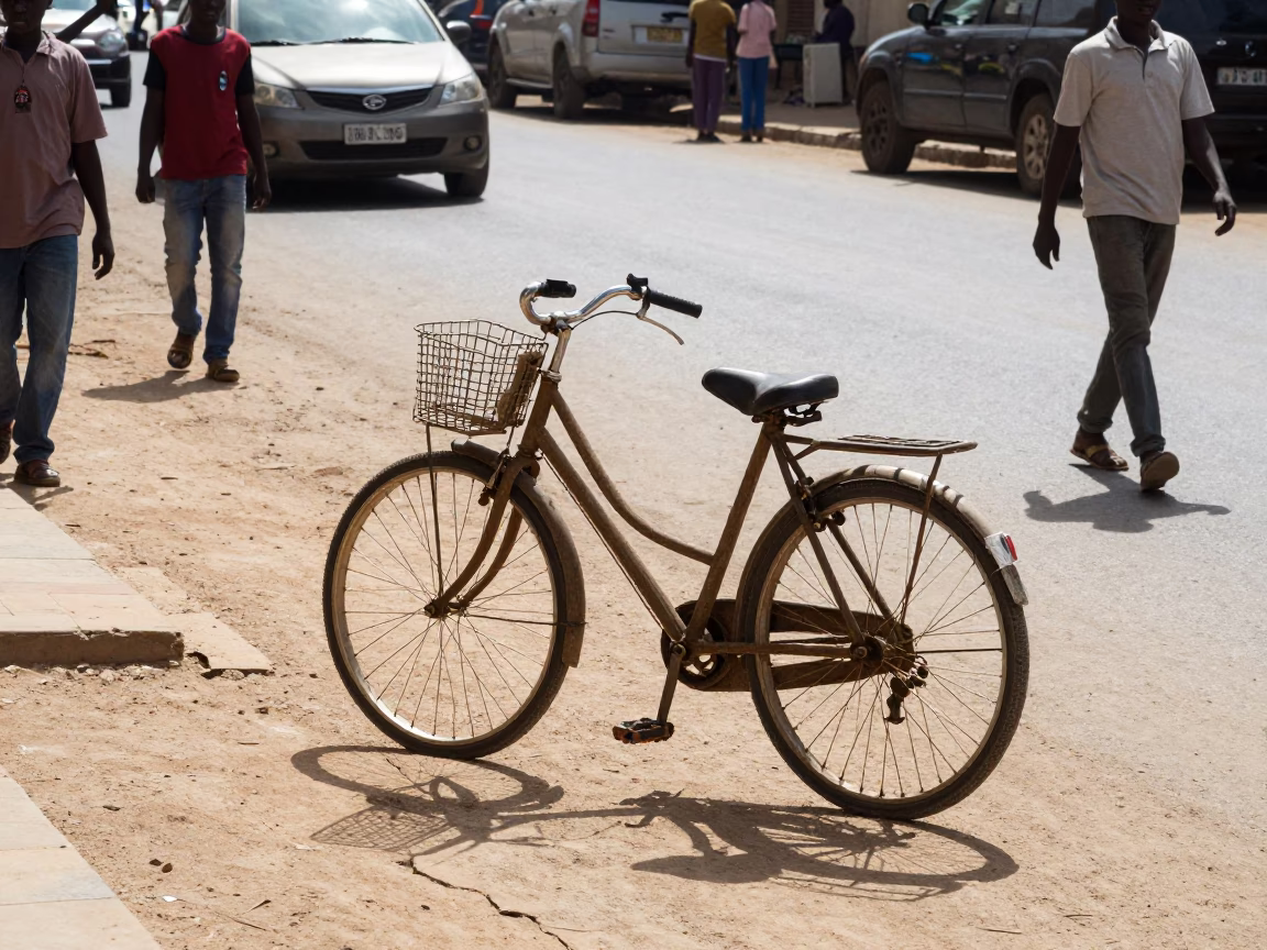 Busy Dakar Street Scene Midday with Bicycle and Local Market Activity in in Dakar, Senegal