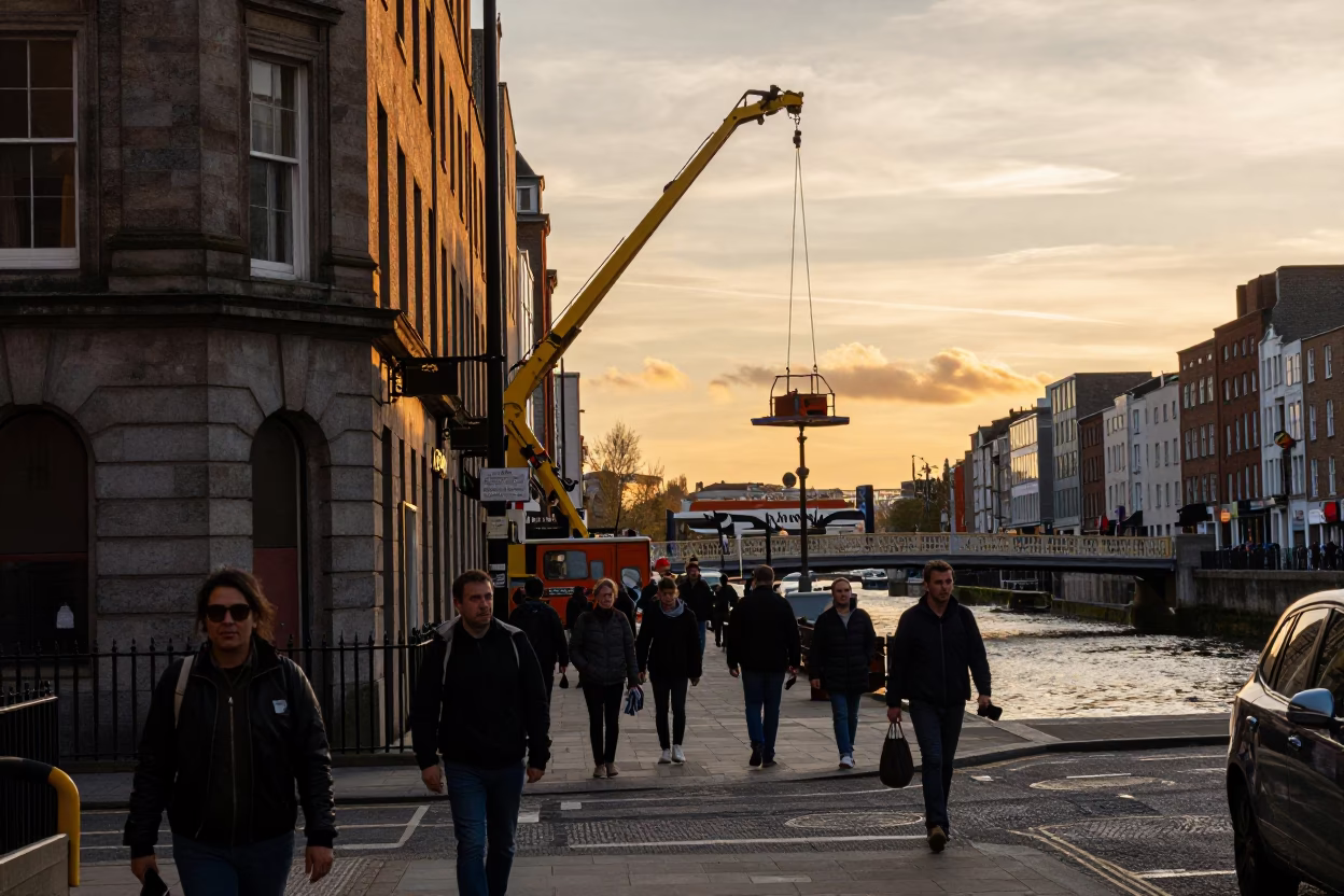 Busy Dublin Street Scene at Sunset with Bridge Maintenance and Local Interaction in in Dublin, Ireland