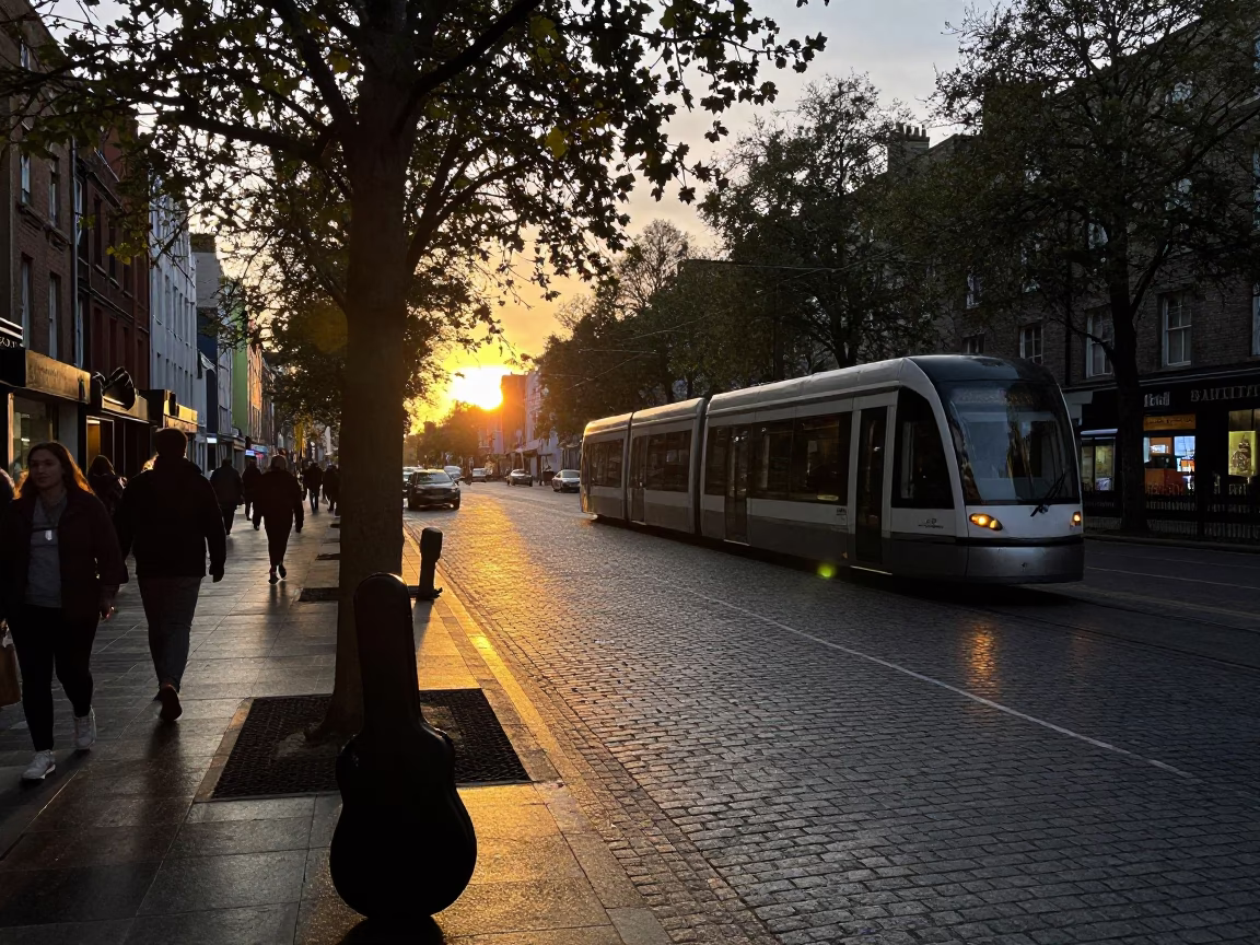 Busy Dublin Street Scene at Sunset with Guitar Case and Local Commerce in in Dublin, Ireland
