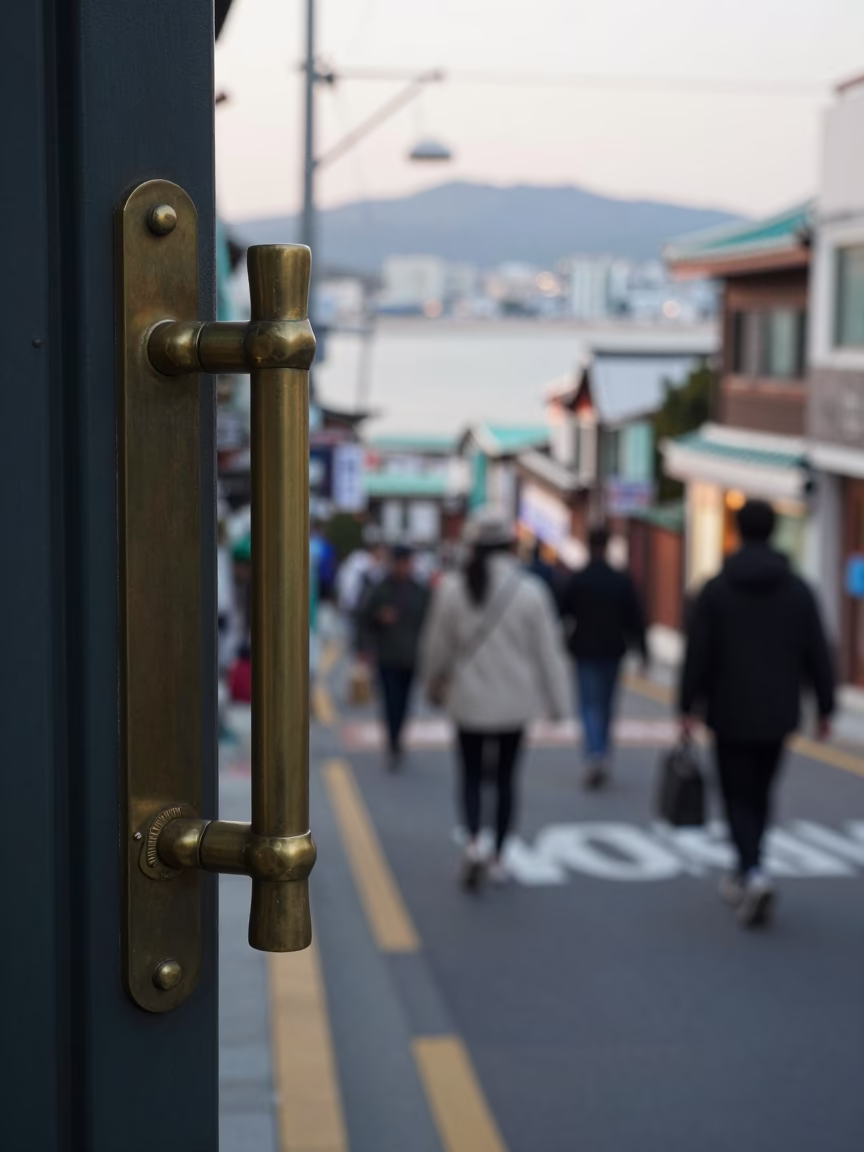 Busy Early Morning Busan Street Scene with Door Handle and Local Life in in Busan, South Korea