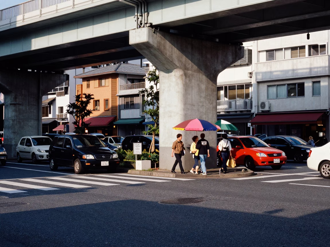 Busy Fukuoka Street Scene Under Highway Overpass with Umbrella Vendor and Pedestrians in in Fukuoka, Japan