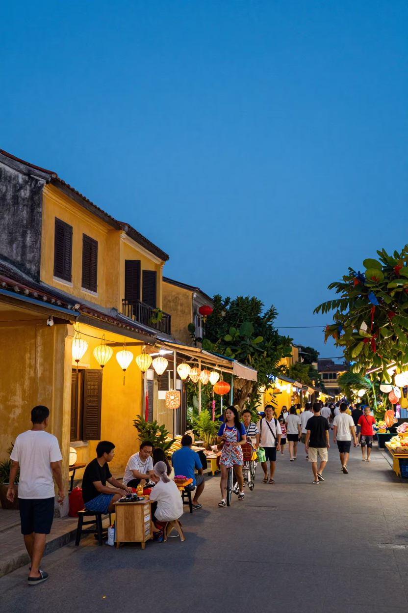 Busy Hoi An Street Scene at Blue Hour with Lanterns and Local Vendors in in Hoi An, Vietnam