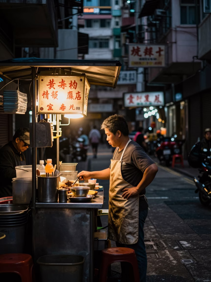 Busy Hong Kong street food stall predawn morning with vendor and mochi in in Hong Kong, Hong Kong