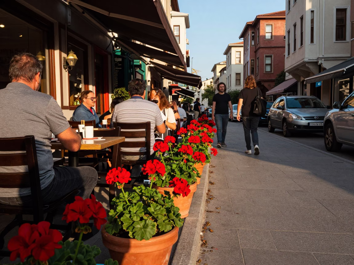 Busy Istanbul Street Scene Late Afternoon Light with Geraniums and Teacups in in Istanbul, Turkey