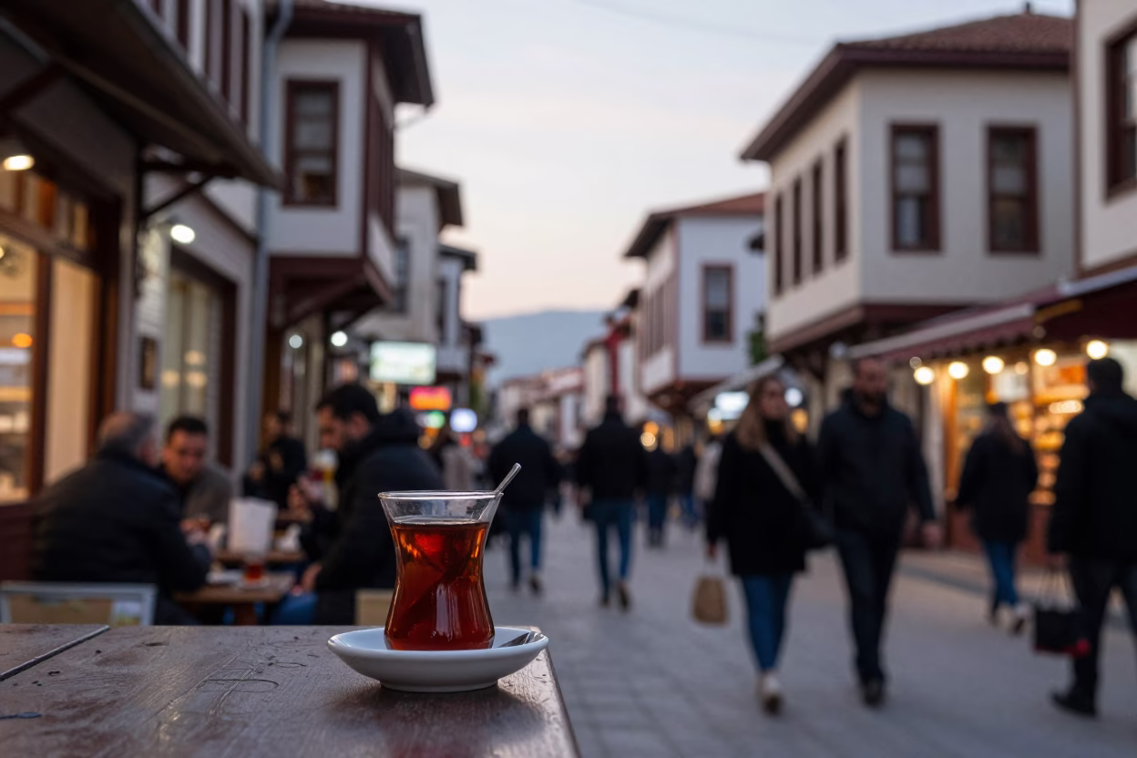 Busy Izmir Turkey Early Evening Street Scene with Traditional Tea Stains on Hook Plate in in Izmir, Turkey
