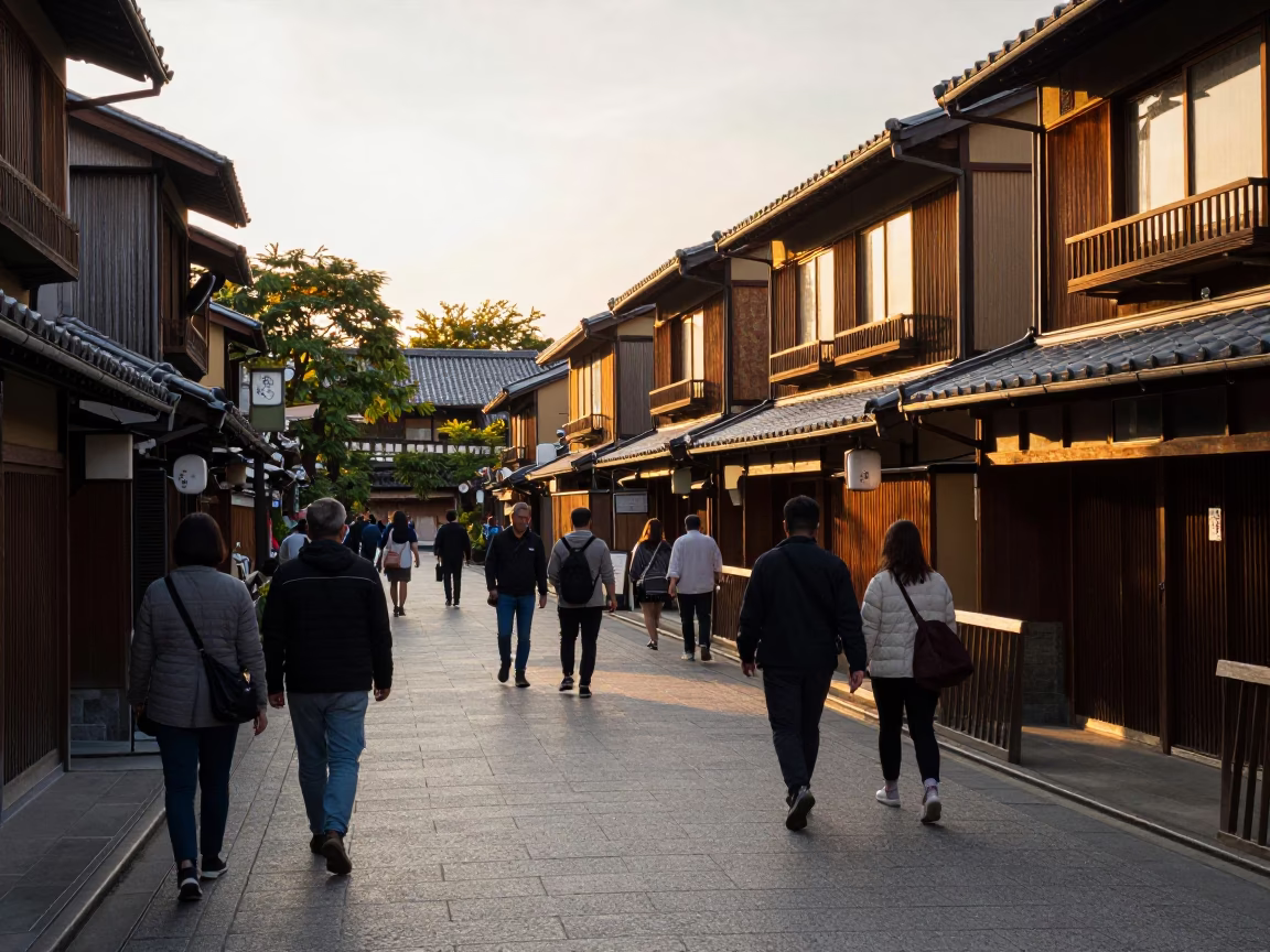 Busy Kyoto Street Scene at Golden Hour with Traditional Architecture and Local Life in in Kyoto, Japan