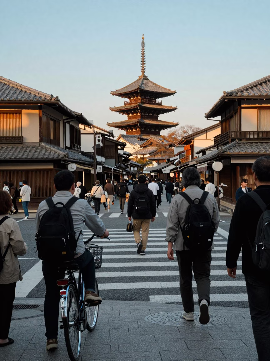 Busy Kyoto Street Scene Early Afternoon with Bicycle Basket and Wet Umbrellas in in Kyoto, Japan