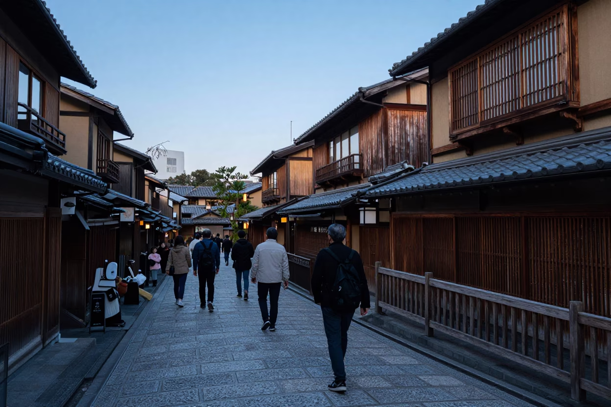 Busy Kyoto Street Scene Early Evening with Traditional Architecture and Pedestrians in in Kyoto, Japan