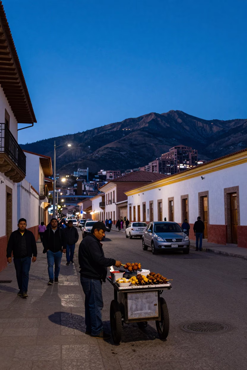 Busy La Paz Bolivia Street Scene in Indigo Twilight with Anticuchos and Spindle Chairs in in La Paz, Bolivia
