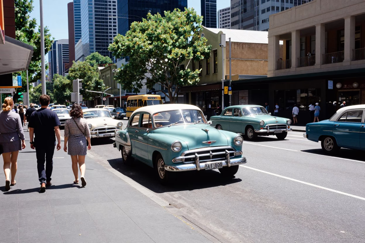 Busy Melbourne Street Scene at Noon with Vintage Cars and Pedestrians in Victoria Australia in in Melbourne, Victoria, Australia