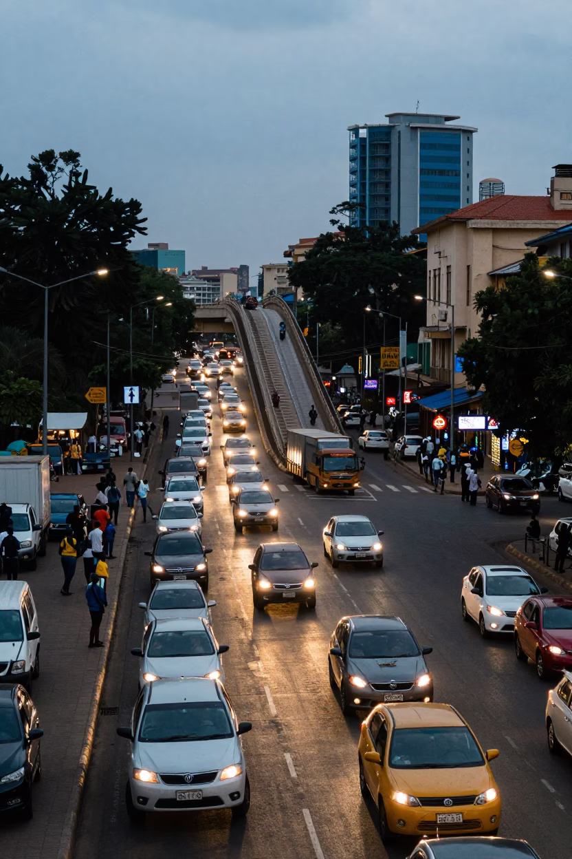 Busy Nairobi Street Intersection at Dusk with Traffic and Pedestrians in in Nairobi, Kenya