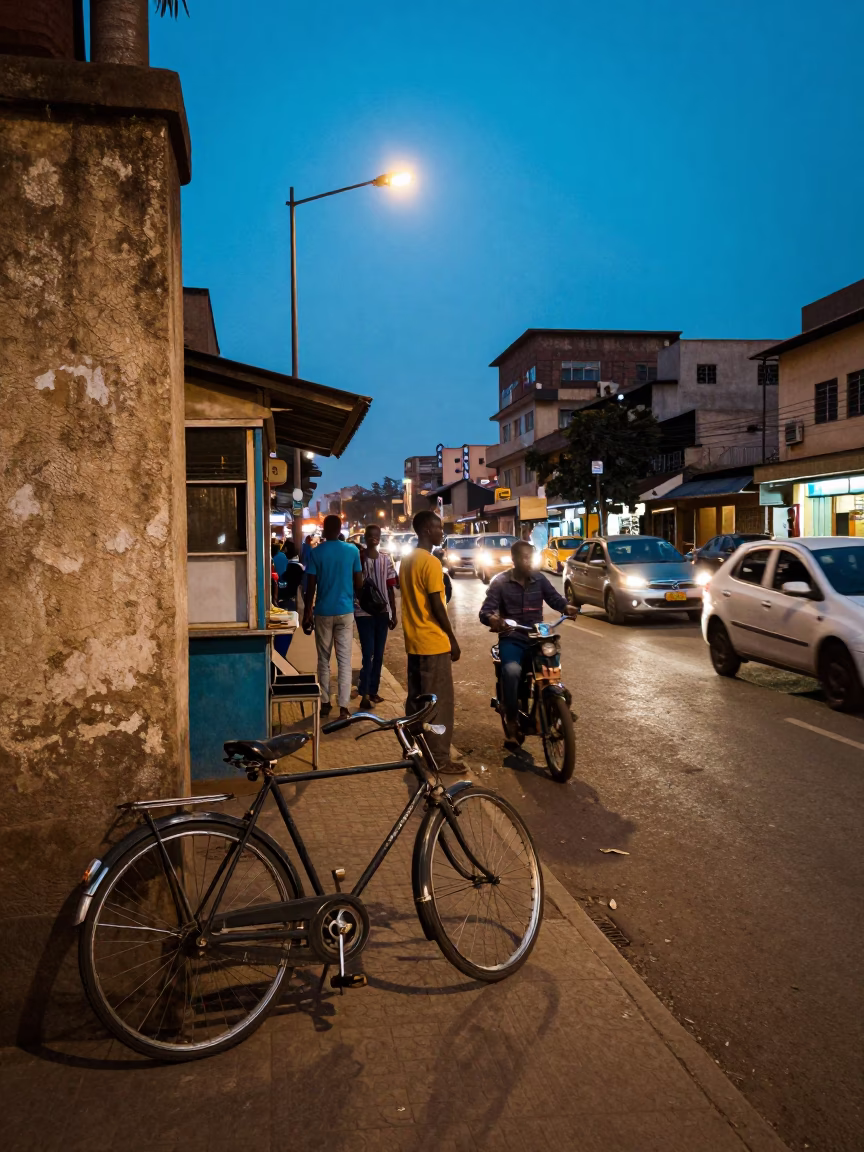 Busy Nairobi Street Scene at Blue Hour with Vintage Bicycle and Highway Flyover in in Nairobi, Kenya