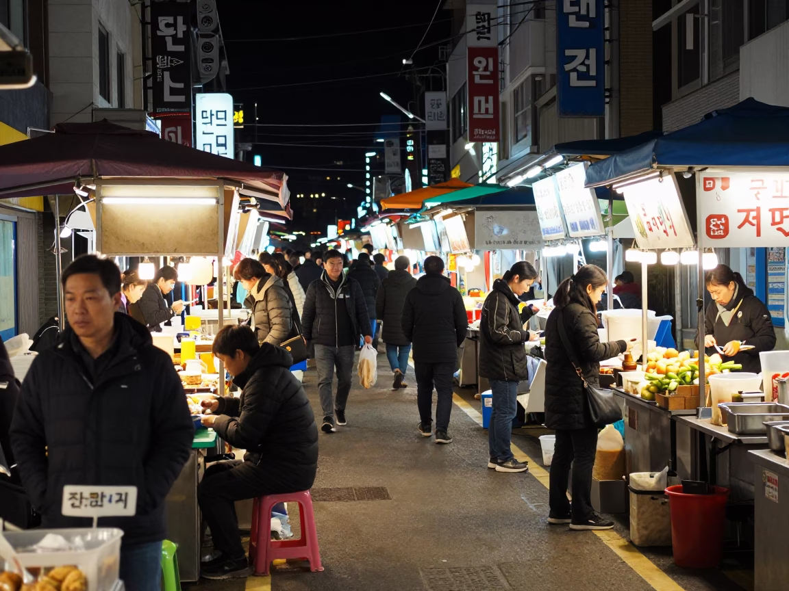 Busy Night Street Scene in Busan South Korea with Food Vendors and Pedestrians in in Busan, South Korea