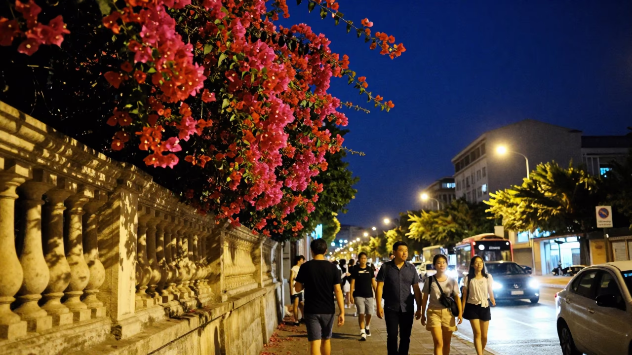Busy Night Street Scene in Nice France with Bougainvillea and Urban Pedestrians in in Nice, France