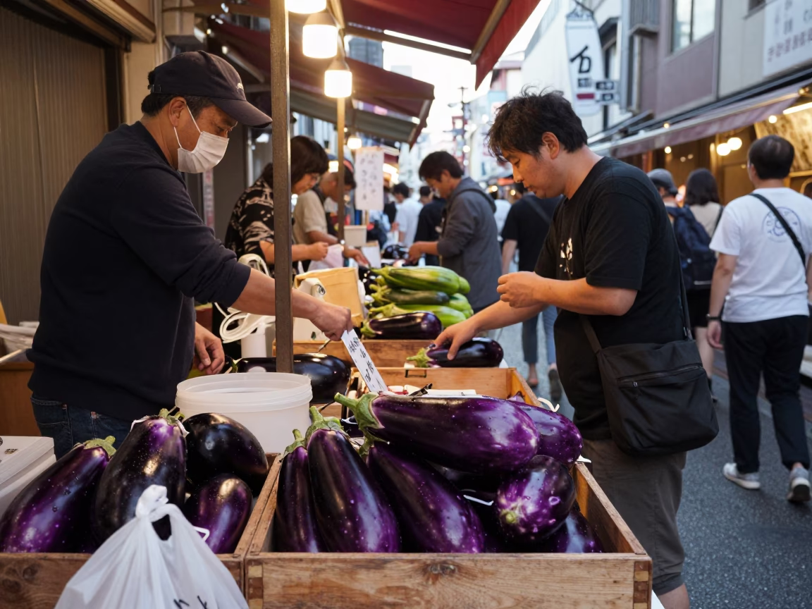 Busy Osaka Street Stall Late Afternoon with Eggplants and Traditional Vendors in in Osaka, Japan