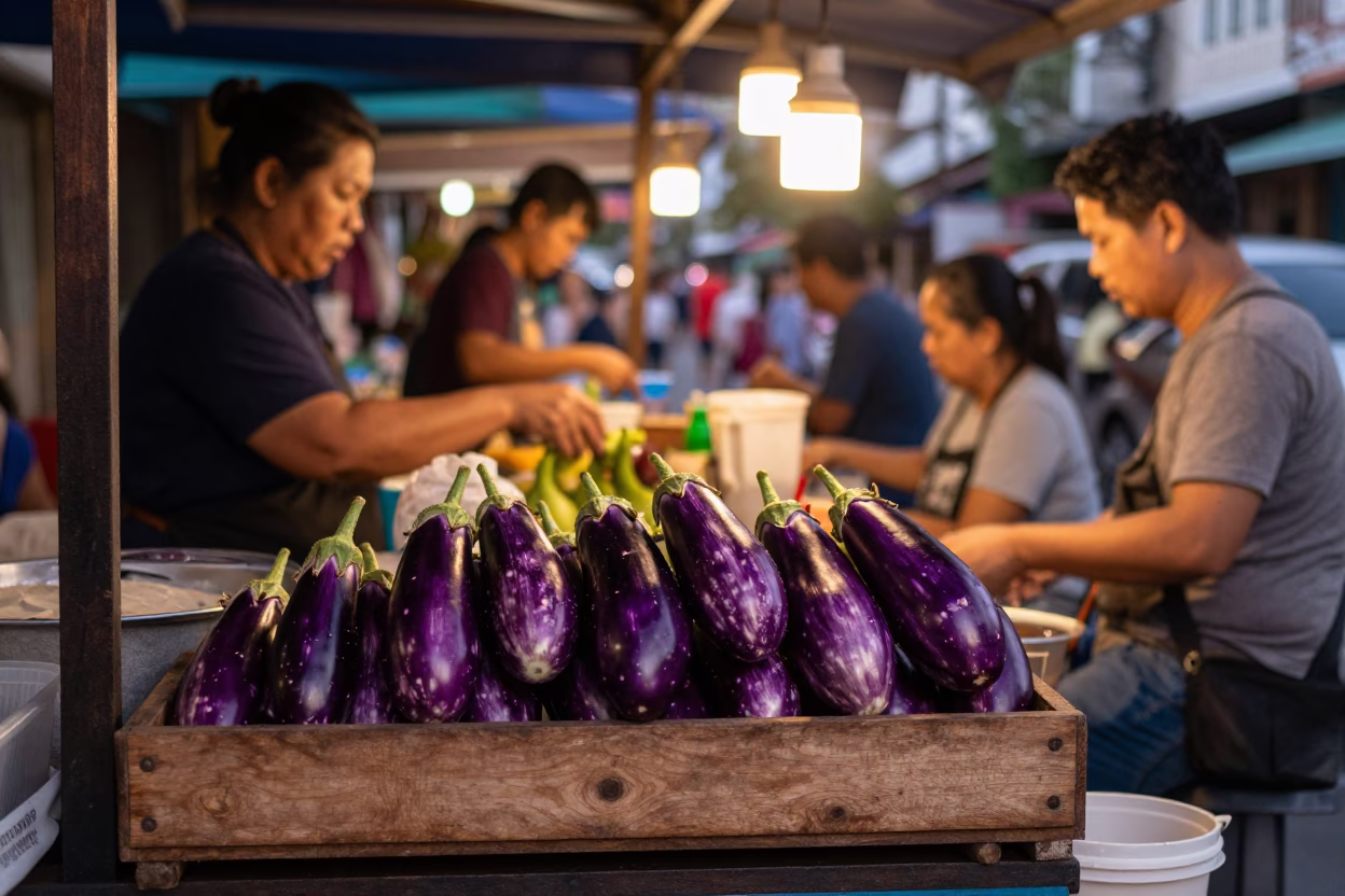 Busy Phuket Street Stall with Eggplants and Local Life Before Dusk in in Phuket, Thailand