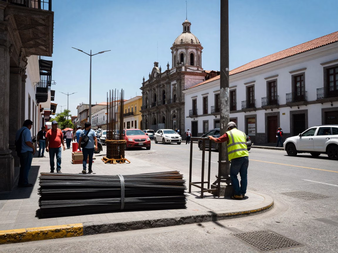 Busy Quito Ecuador Street Scene Under Noon Sun With Construction Gate And Monorail in in Quito, Ecuador