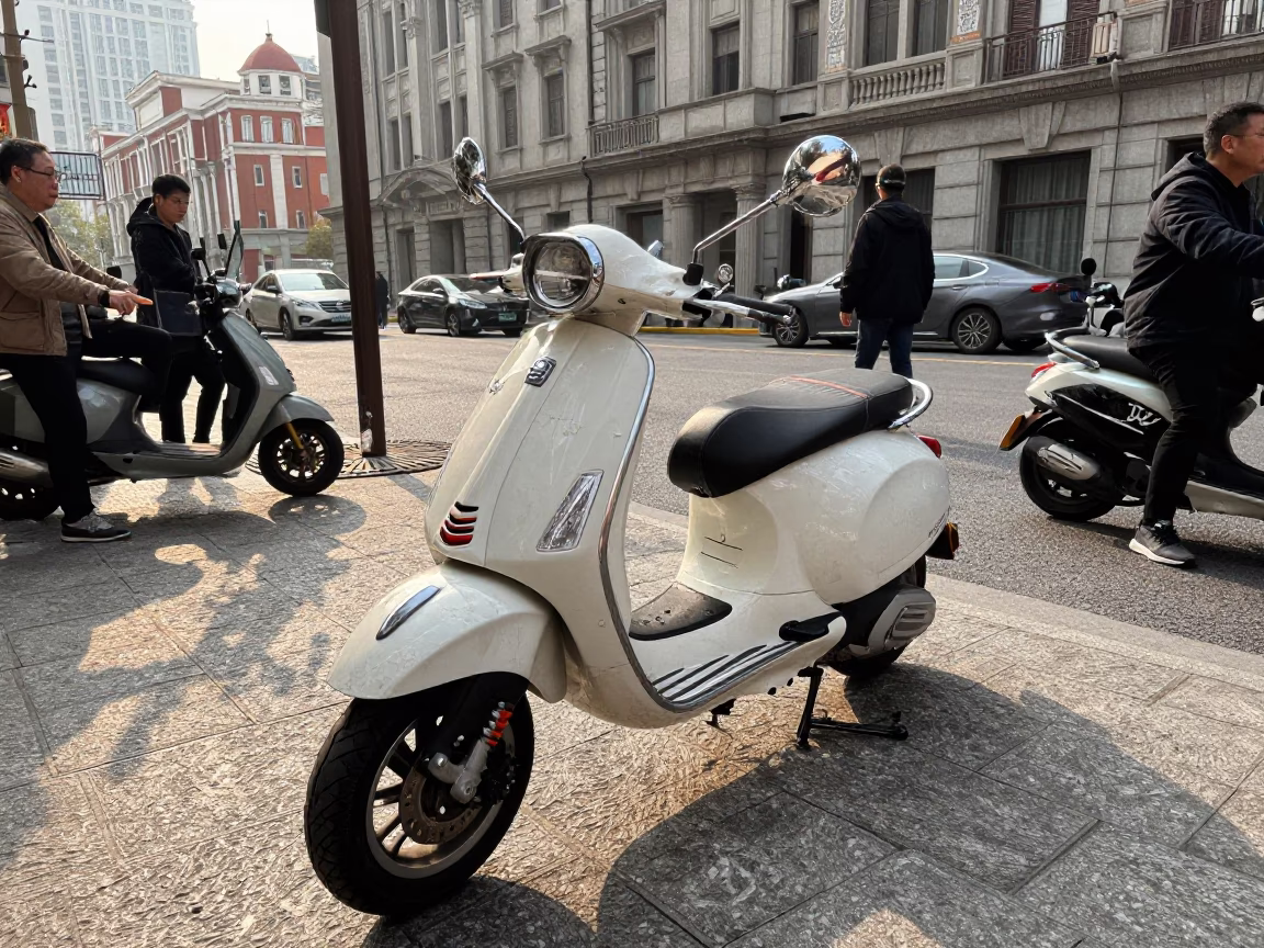 Busy Shanghai Street Scene Late Morning with Vintage Vespa on Cobblestone Lane in in Shanghai, China