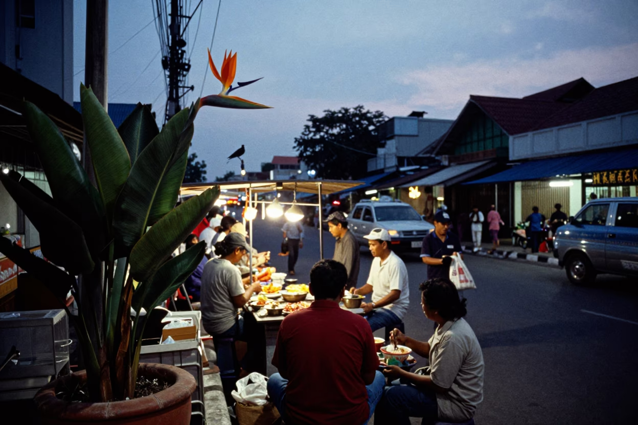 Busy Surabaya Street Scene at Indigo Twilight with Bird of Paradise and Local Commerce in in Surabaya, Indonesia
