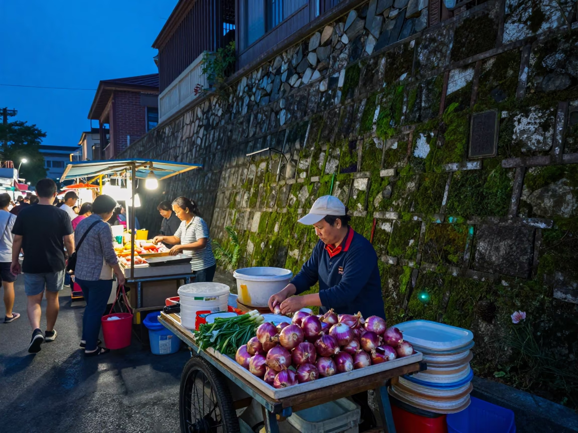 Busy Tainan Street Stall Evening Moss Stone Wall Blue White Porcelain in in Tainan, Taiwan