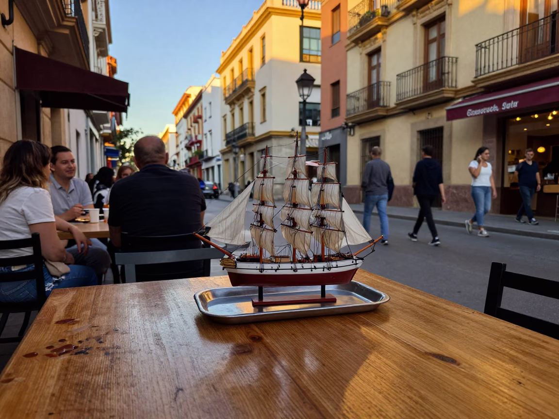 Busy Valencia Street Scene Honeyed Evening Light Model Ship and Caster Wheel in in Valencia, Spain