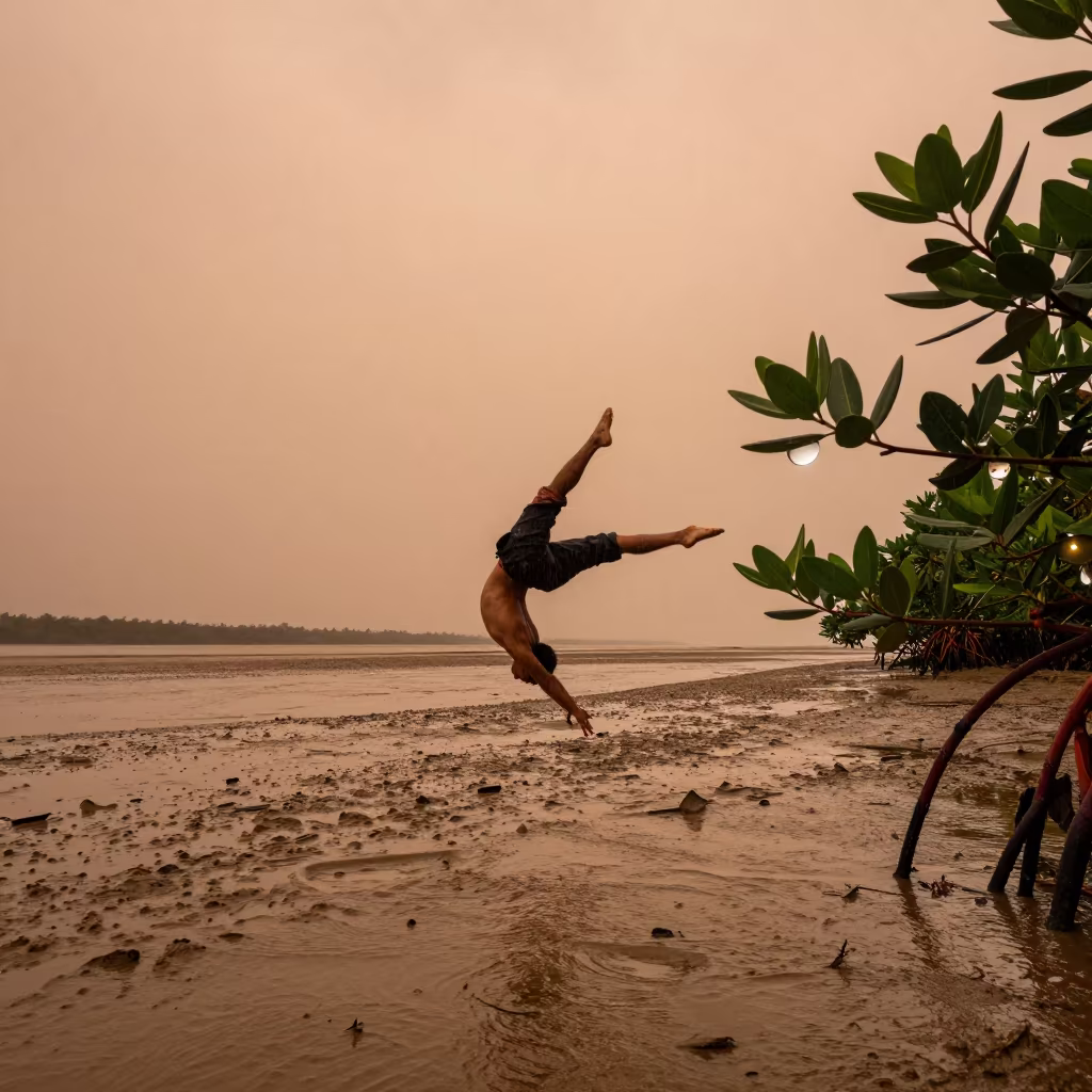 Butterfly Twist Athlete Amidst Giant Raindrop in beside a tidal inlet near Kamsar