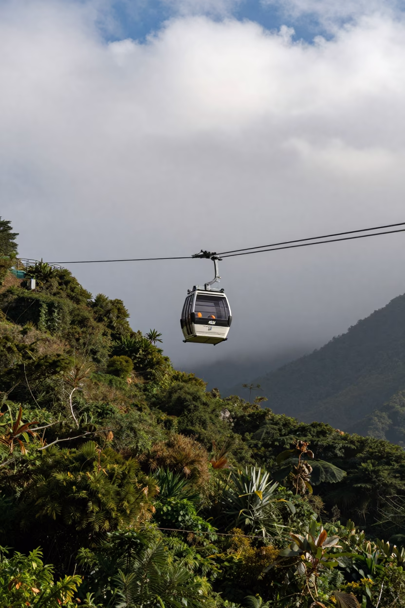 Cable Car Emerging From Clouds in Late Afternoon in near Conakry