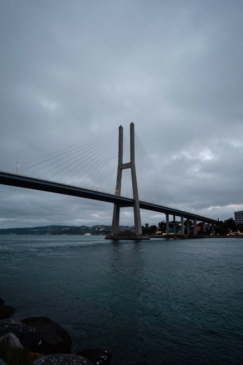 Cable-stayed bridge illuminated against a dark harbor Hobart Tasmania early afternoon in in Hobart, Tasmania, Australia