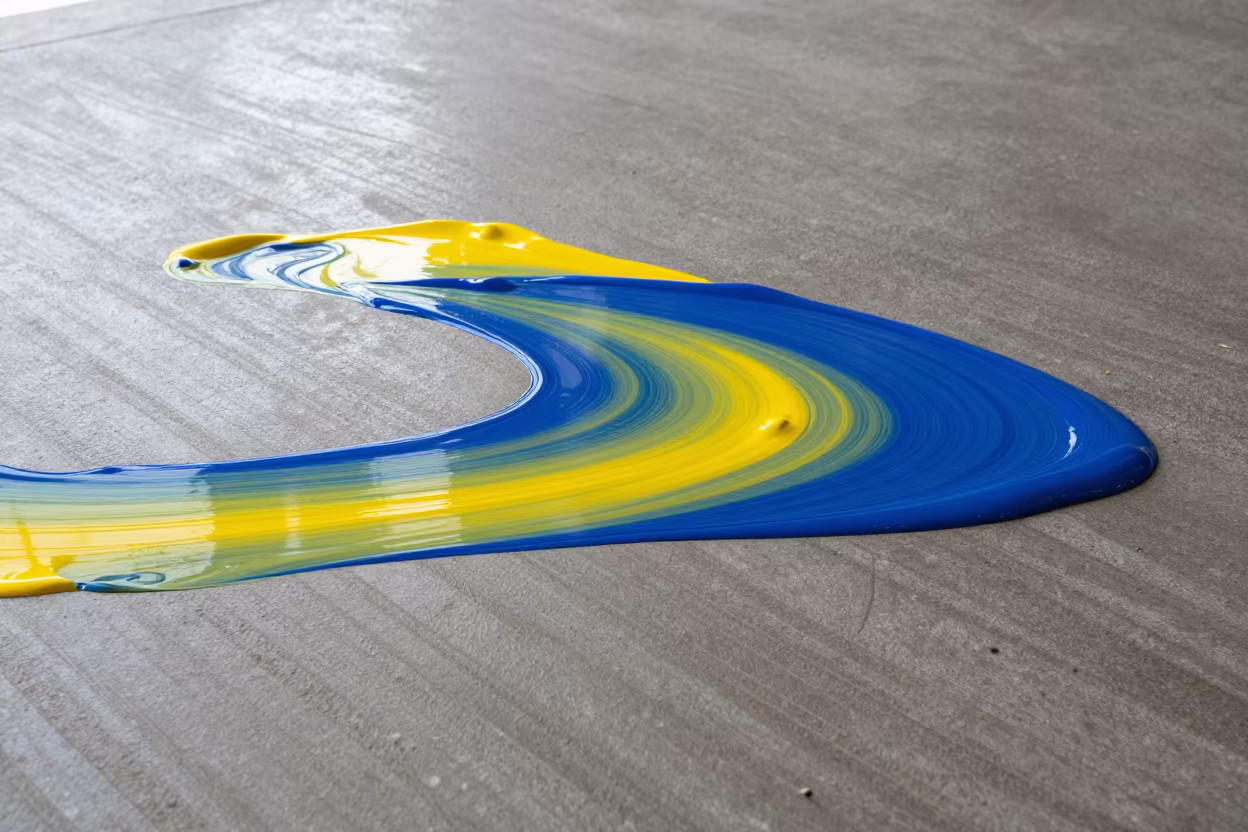Cadmium and Ultramarine Oil Swirls in inside a ribbed concrete lobby in Łódź