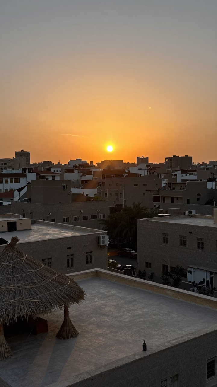 Cairo Egypt Sunset Horizon View Over Urban Rooftops and Thatched Reed Bundles in in Cairo, Egypt