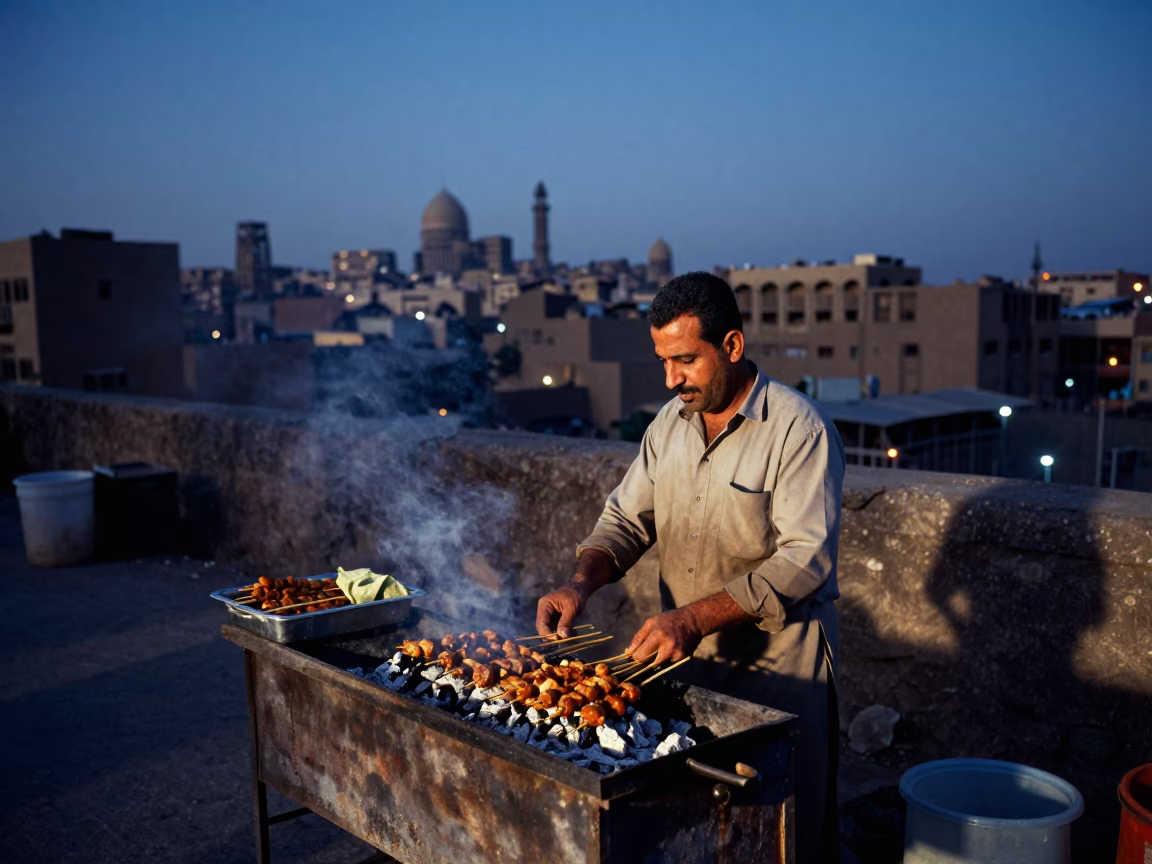 Cairo Street Vendor Preparing Sate Skewers Over Charcoal Before Sunrise in Egypt in in Cairo, Egypt