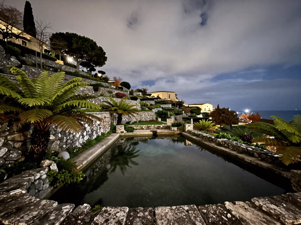 Campania Sacred Spring Pool Stone Ferns in among terraced garden plots in Campania