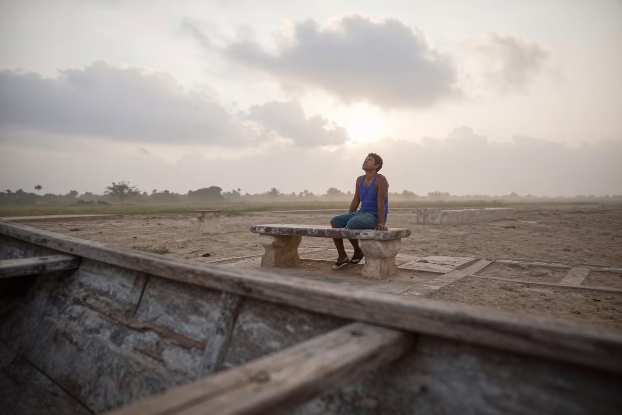 Campeche Boatbuilder Dawn Gaze at Courtyard Bench in in Campeche