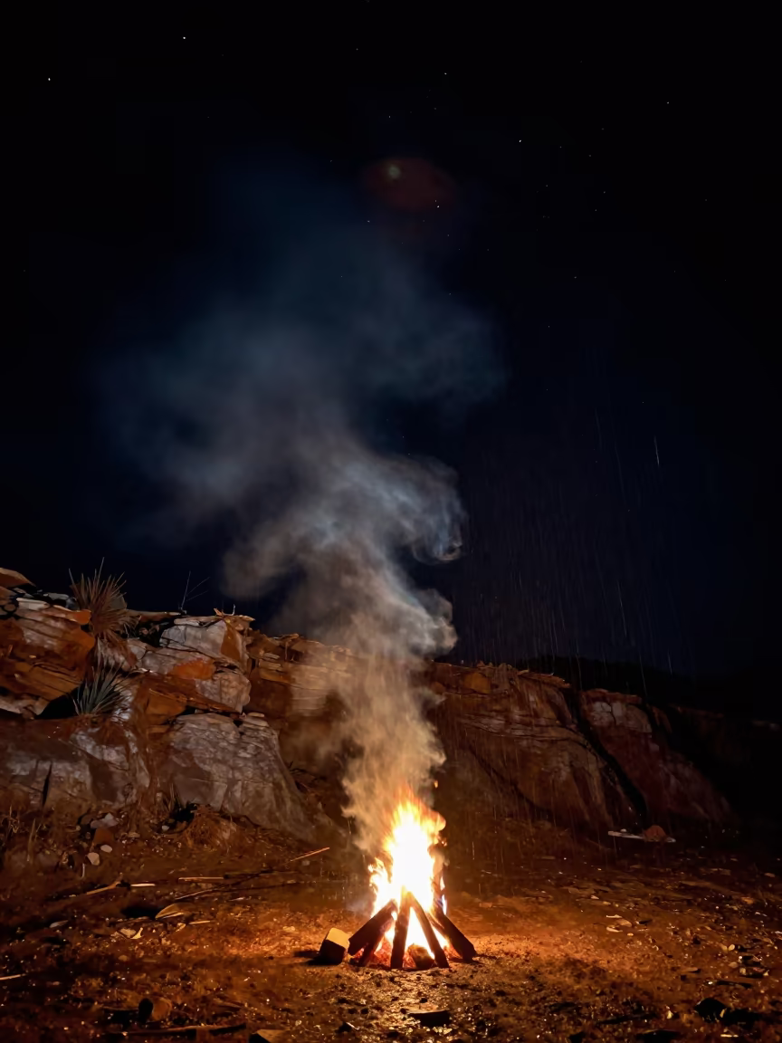 Campfire Smoke Spiral Under Arunachal Night in beneath a wind-cut desert escarpment in Arunachal Pradesh