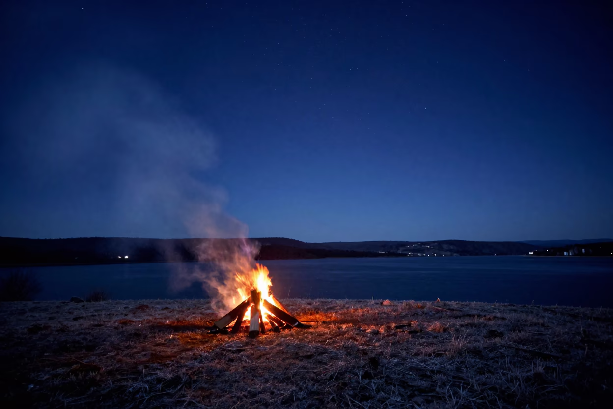 Campfire Smoke Spiral Over Starry Night Sky in from a frost-hushed ridgeline near La Libertad