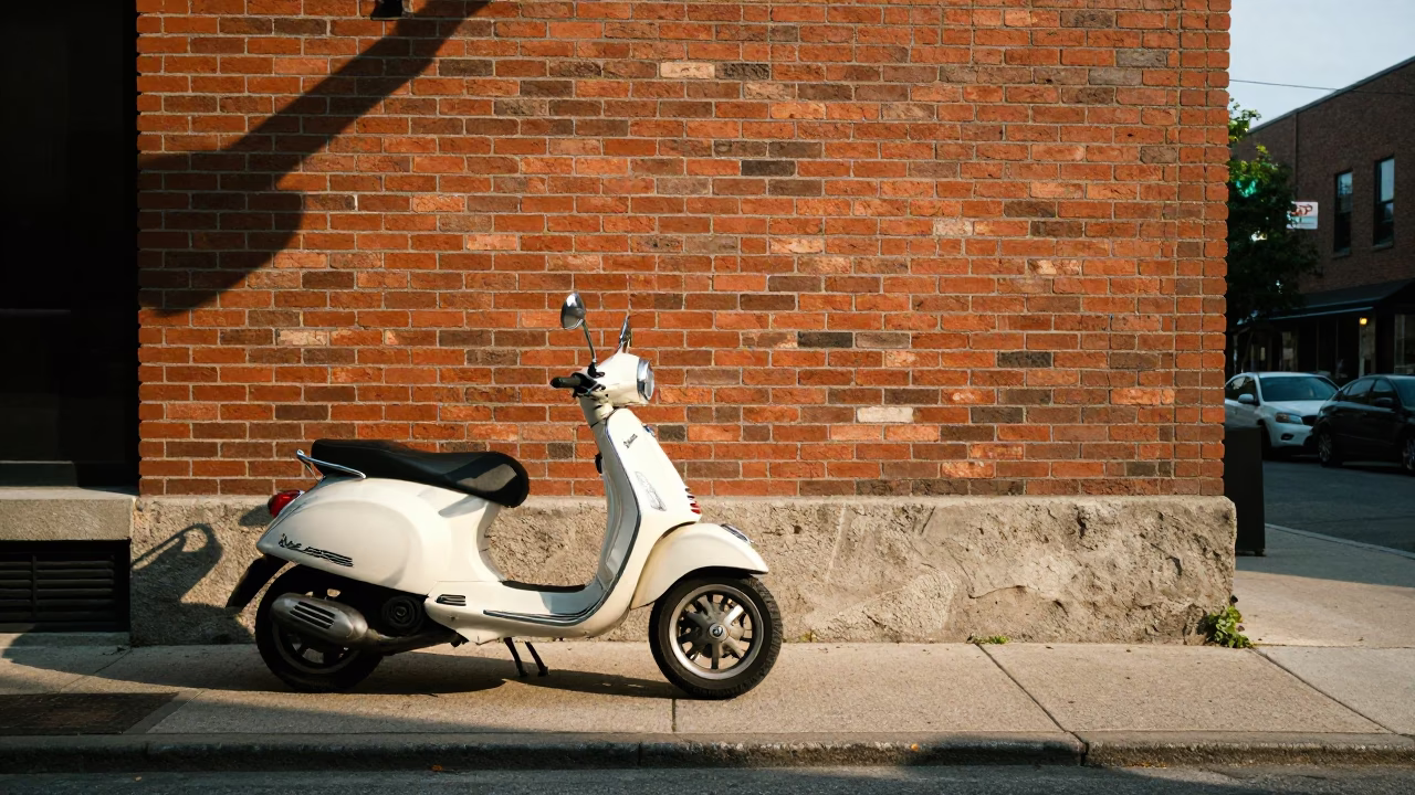 Candid Toronto Street Scene with Vintage Vespa and Urban Greenery in in Toronto, Ontario, Canada