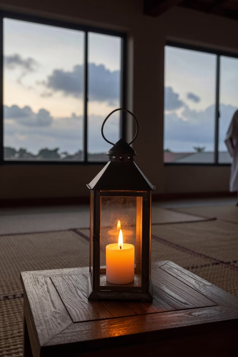 Candle in Glass Lantern on Iseyin Hall Table in in a ceremonial hall in Iseyin