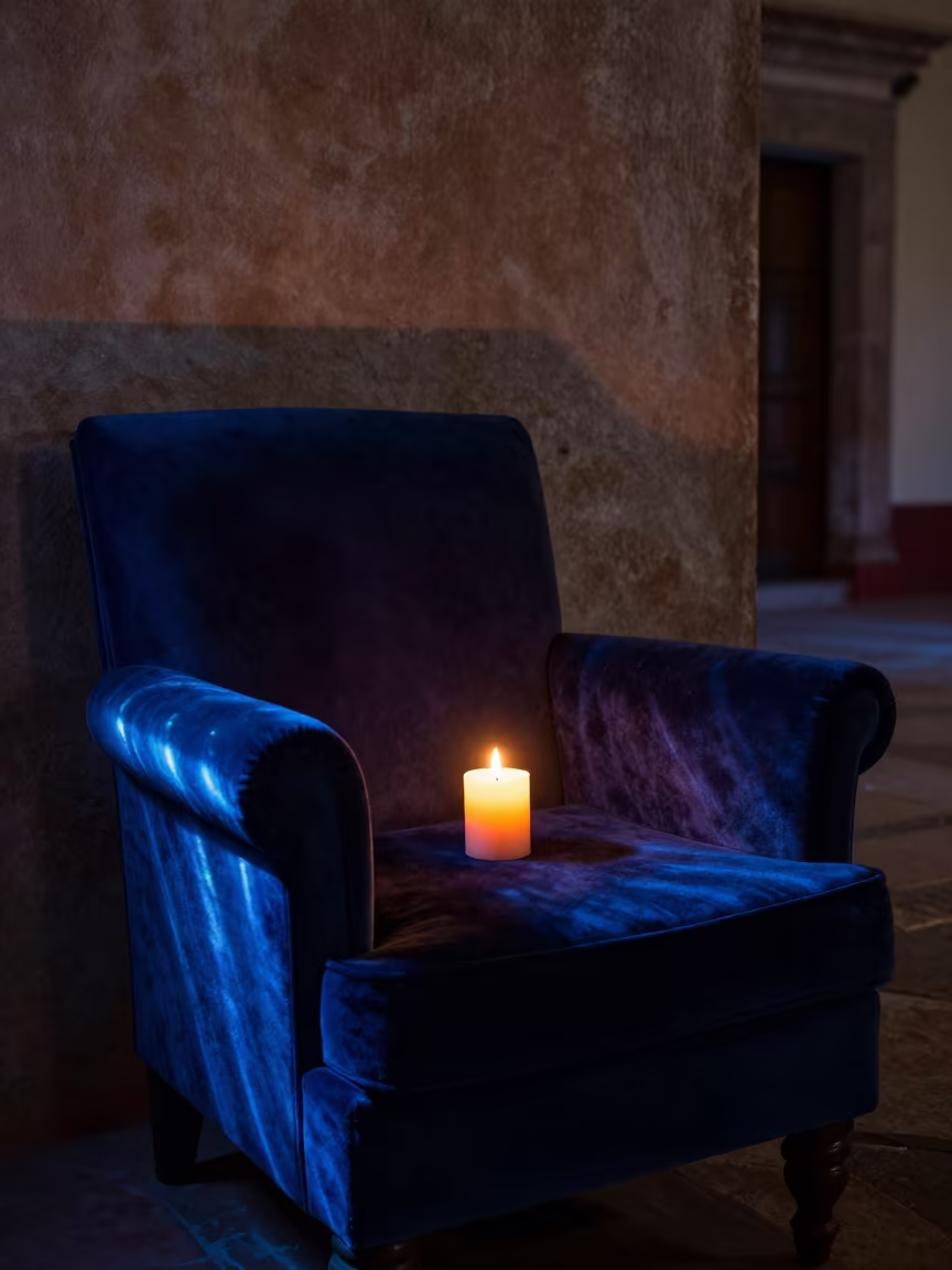 Candle on Velvet Chair in Oaxaca Night in on a velvet chair in Oaxaca