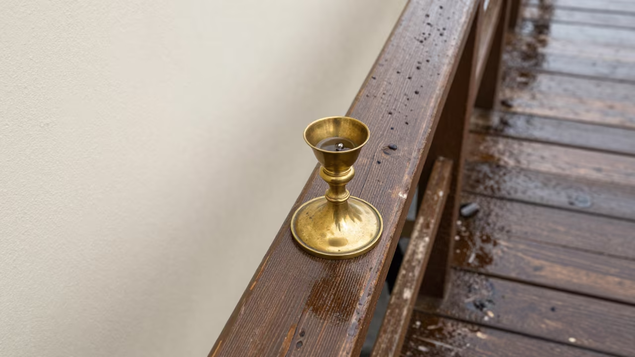 Candlestick on Pier Railing Noon Light in on a pier railing near Port-de-Paix