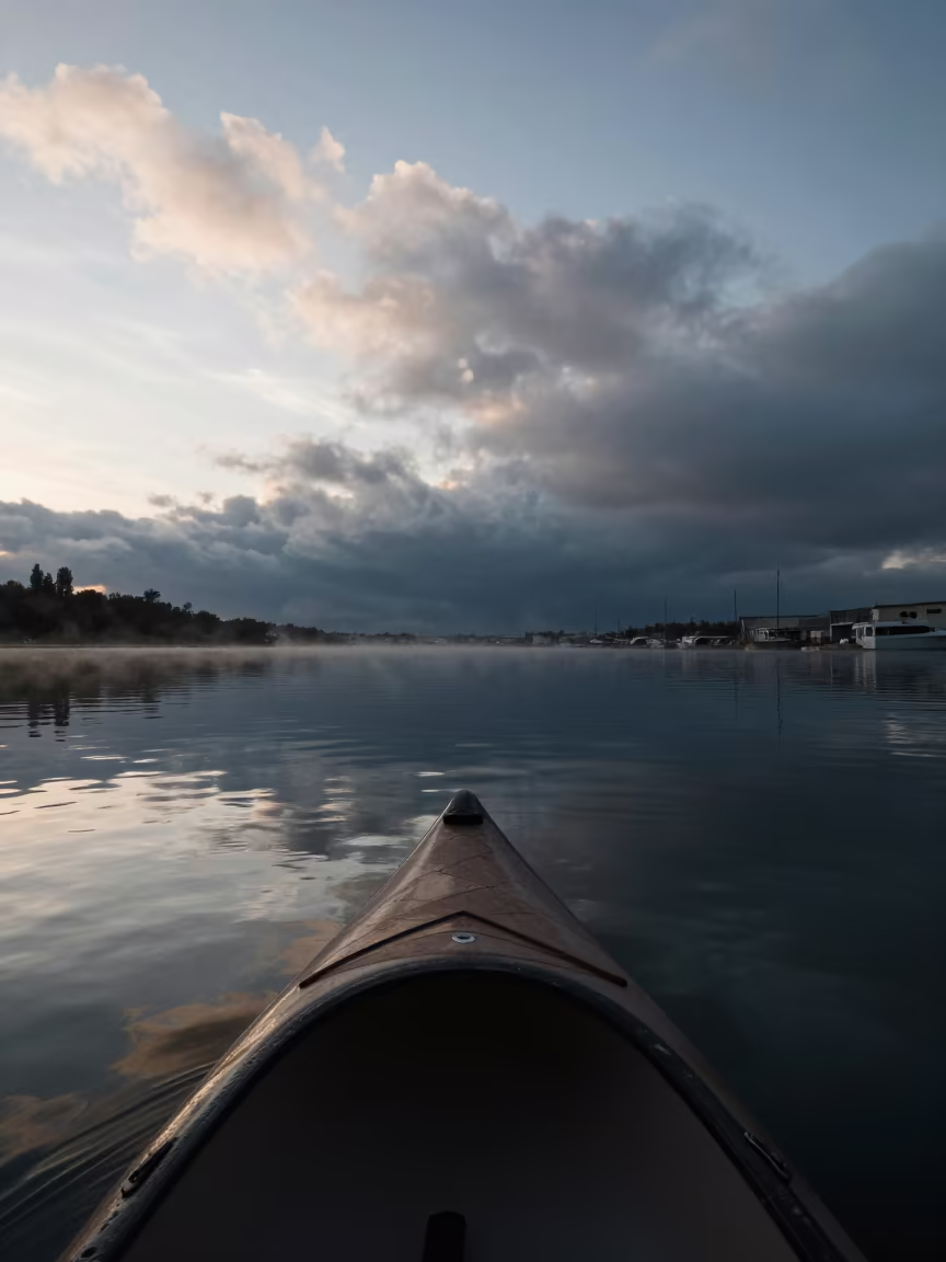 Canoe Expedition Twilight Foggy Seville Harbor in beside a fogbound harbor mouth near Macarena, Seville