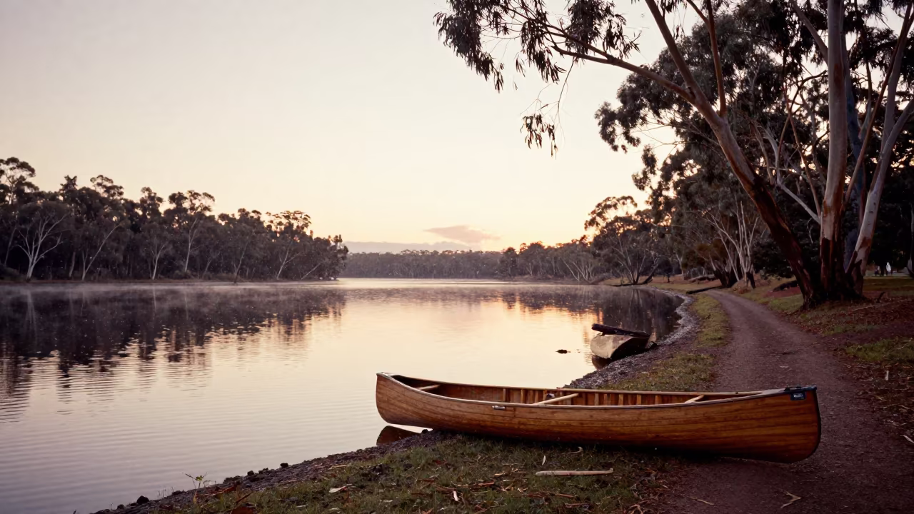Canoe on Glassy Lake Before Sunset in along a switchback approach in New South Wales