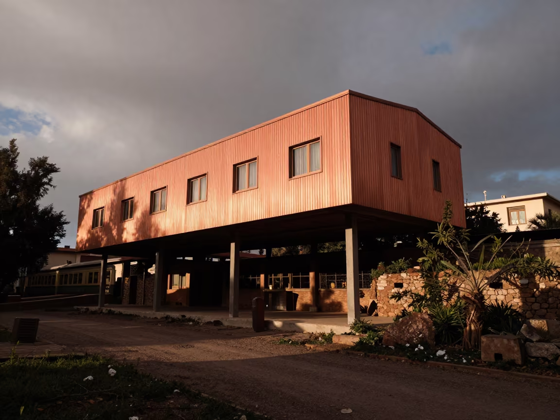 Cantilevered House Over Ravine in Restored Terminal in inside a restored train terminal near New Borg El Arab