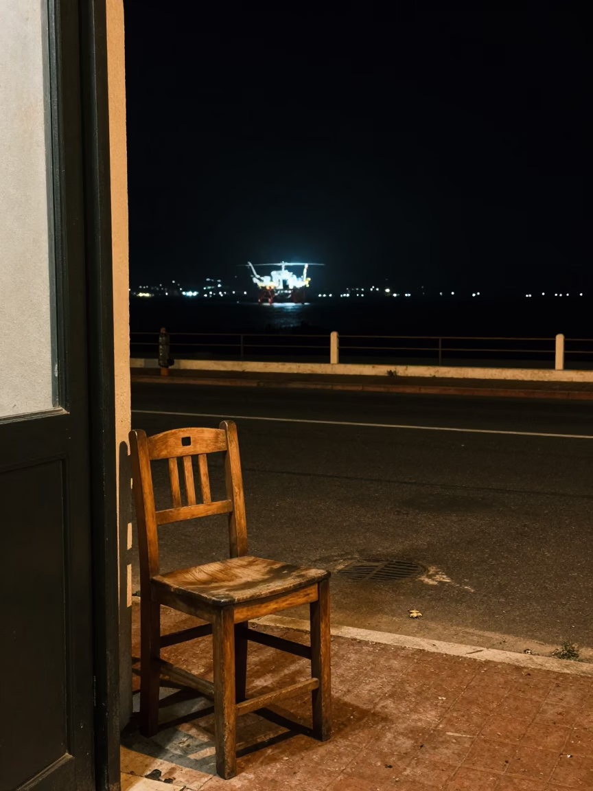 Cape Town Night Street Scene with Smudged Chair and Distant Helicopter in in Cape Town, South Africa